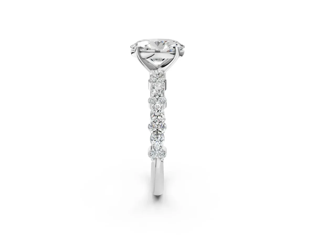 Oval Cut Diamond Side Stone Solitaire Ring with Round Moissanite and Four-Prong Setting White gold