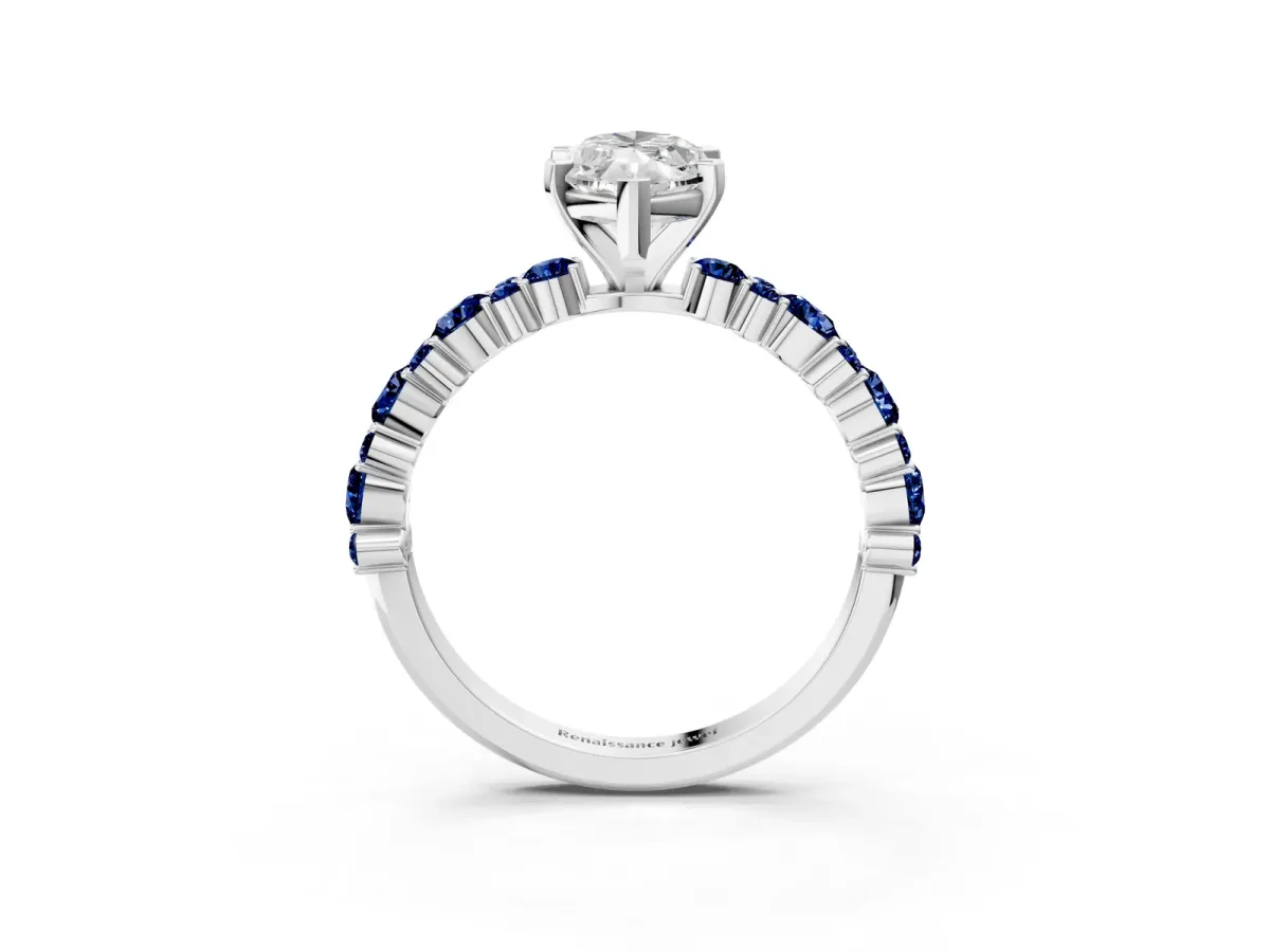 Marquise Cut Diamond Side Stone Solitaire Ring with Round Blue Sapphire and Four-Prong Setting White gold