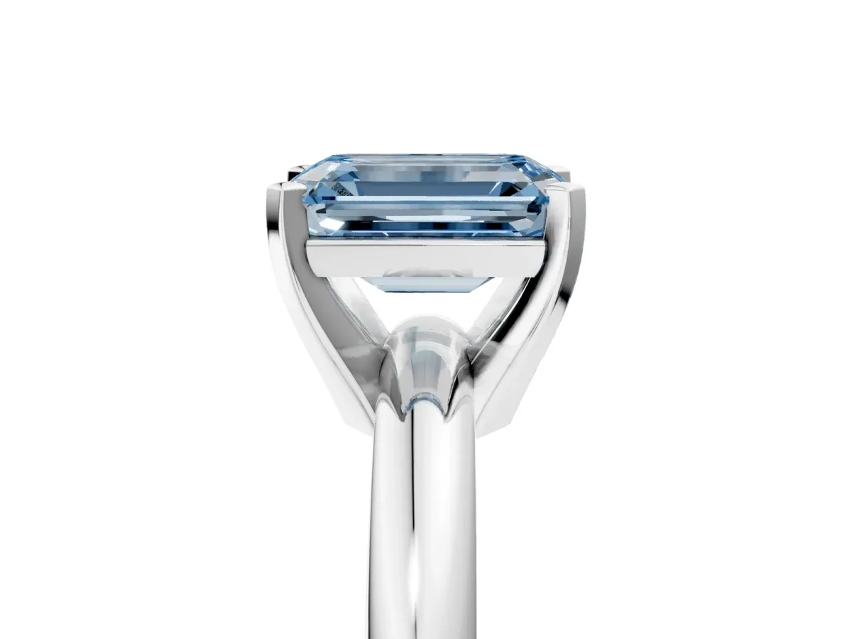 Fancy Blue Emerald Cut Diamond Solitaire Engagement Ring with Round Band and Four-Prong Setting White gold