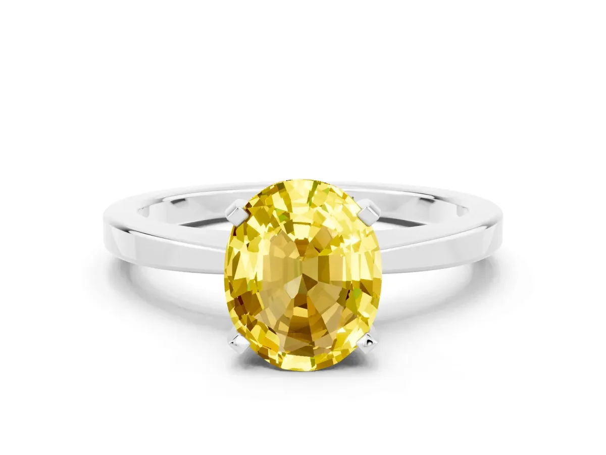 Oval Cut Yellow Sapphire Solitaire Engagement Ring with Classic Band and Four-Prong Setting Silver