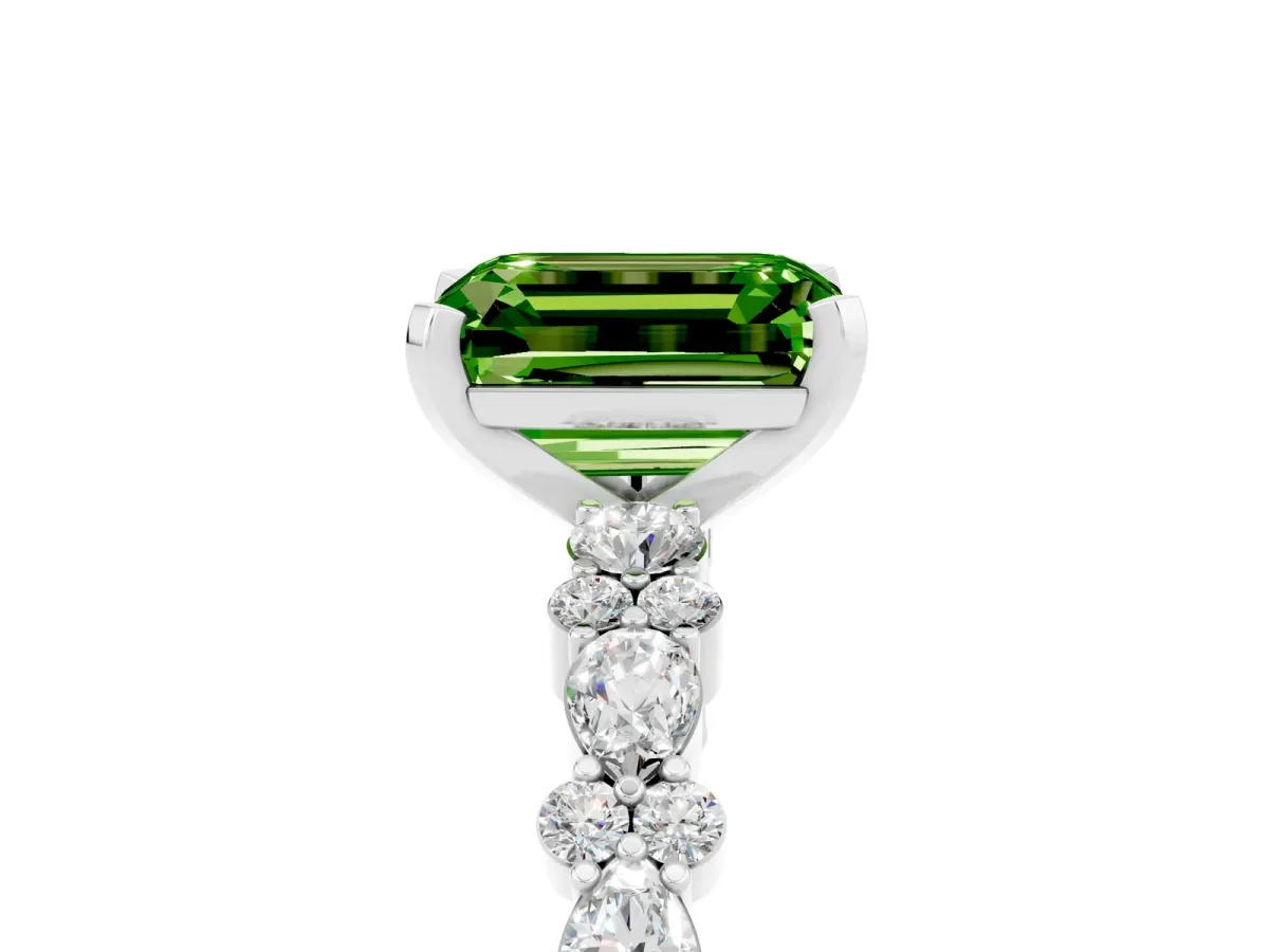 Emerald Cut Peridot Side Stone Solitaire Ring with Round and Four-Prong Setting White gold