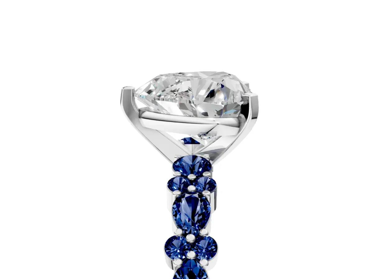 Heart Cut Diamond Side Stone Solitaire Ring with Round Blue Sapphire and Four-Prong Setting White gold