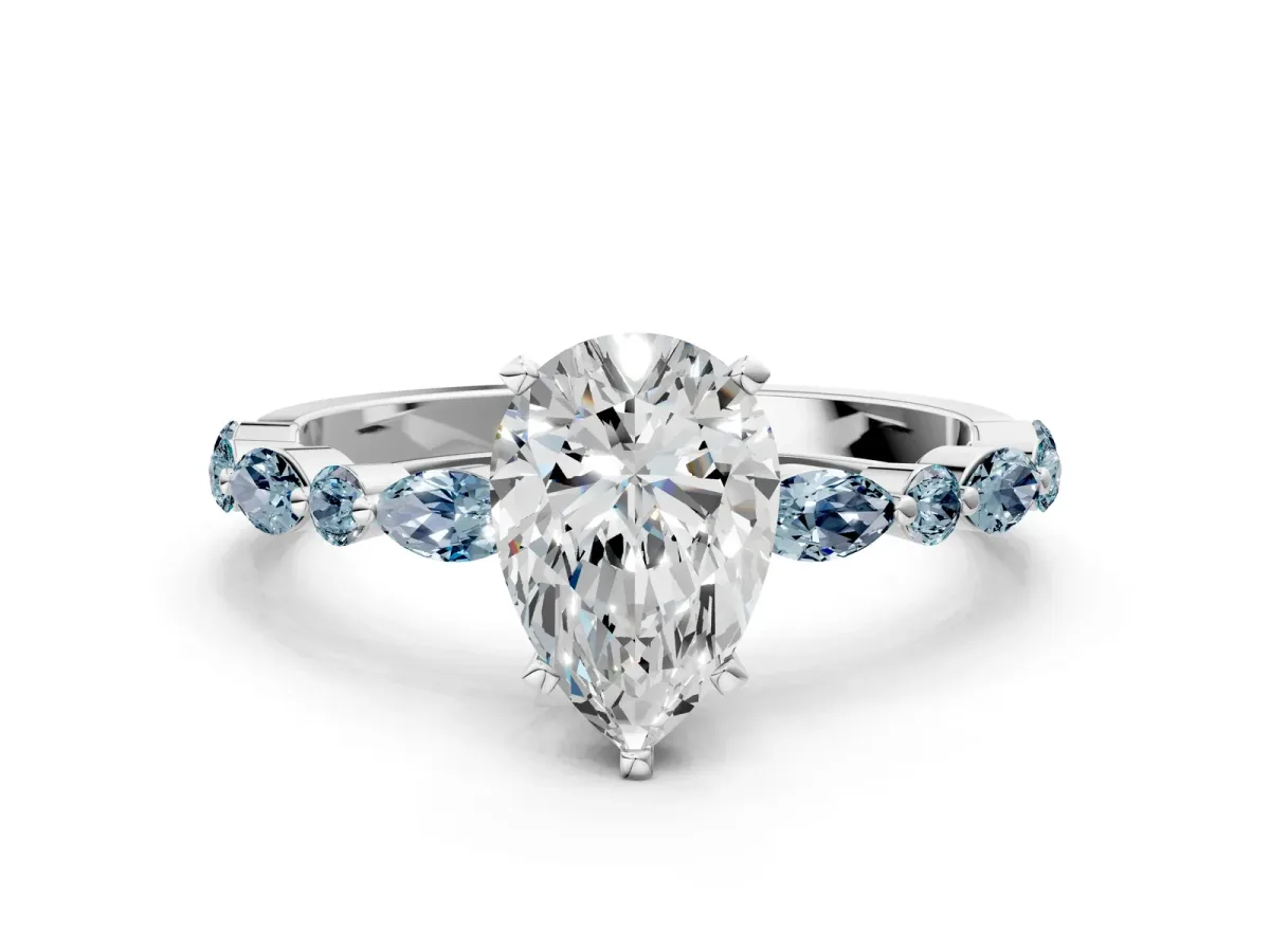 Pear Cut Diamond Ring with Marquise and Round Aquamarine Side Stones and Four-Prong Setting Silver
