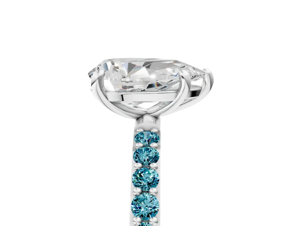 Pear Cut Diamond Solitaire Ring with Round Blue Topaz Pavé Band and Prong Setting Platinum