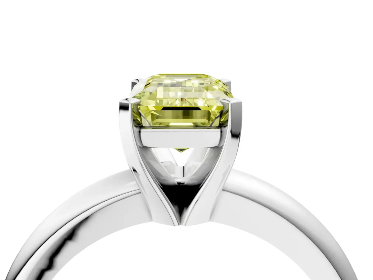 Fancy Yellow Emerald Cut Diamond Solitaire Engagement Ring with Round Band and Four-Prong Setting White gold