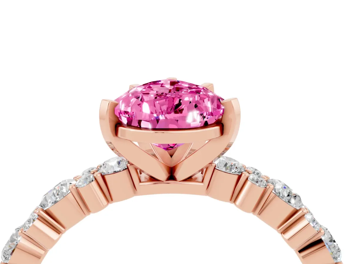 Pear Cut Pink Sapphire Side Stone Solitaire Ring with Round and Four-Prong Setting Rose gold