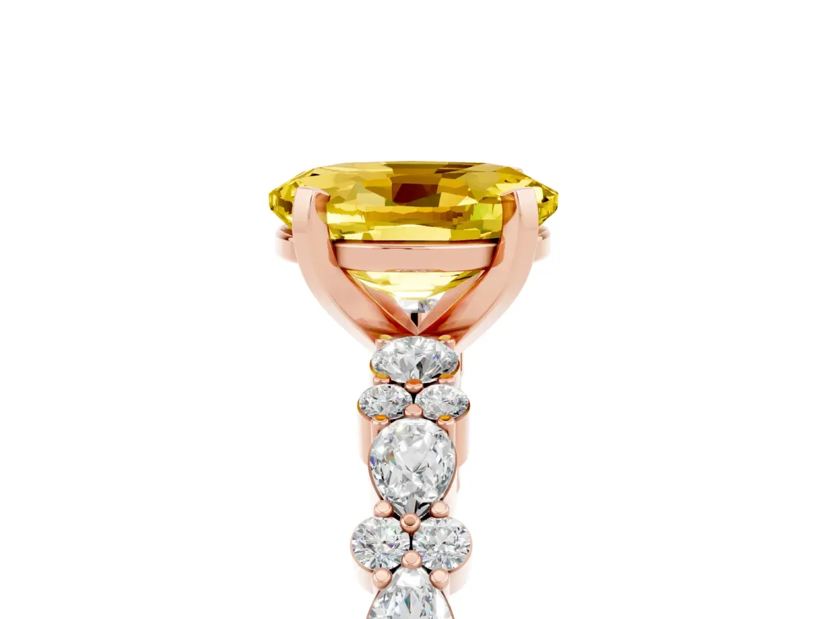 Oval Cut Yellow Sapphire Side Stone Solitaire Ring with Round and Four-Prong Setting Rose gold