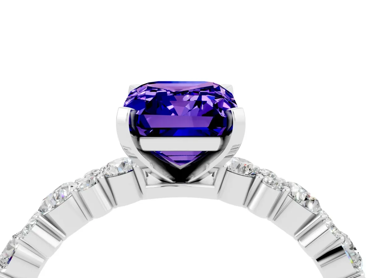 Emerald Cut Tanzanite Side Stone Solitaire Ring with Round and Four-Prong Setting Platinum