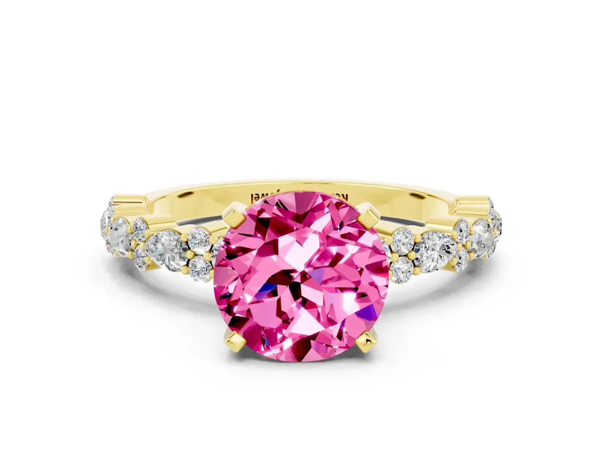 Round Cut Pink Sapphire Side Stone Solitaire Ring with Round and Four-Prong Setting Yellow gold