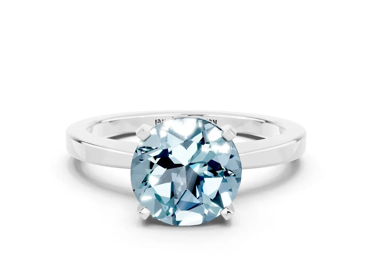 Round Cut Aquamarine Solitaire Engagement Ring with Classic Band and Four-Prong Setting Silver