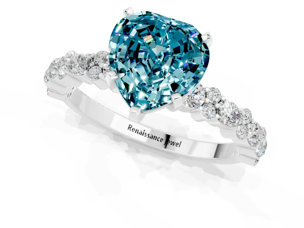 Heart Cut Blue Topaz Side Stone Solitaire Ring with Round and Four-Prong Setting Platinum