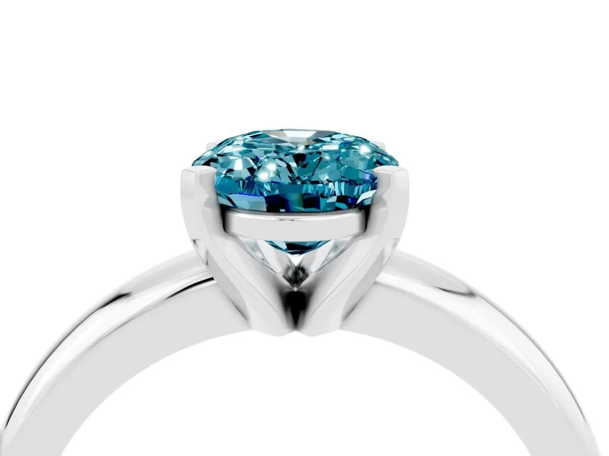 Oval Cut Blue Topaz Solitaire Engagement Ring with Round Band and Four-Prong Setting Platinum