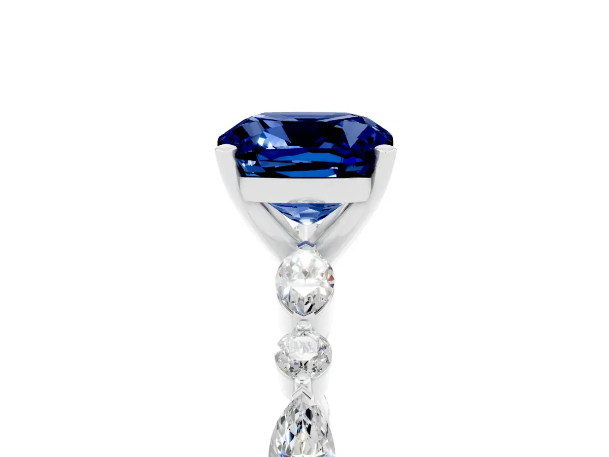 Cushion Cut Blue Sapphire Ring with Marquise and Round Side Stones and Four-Prong Setting Silver