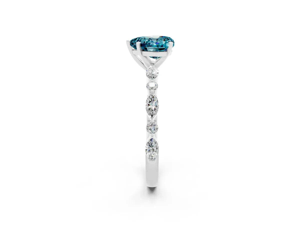 Heart Cut Blue Topaz Ring with Marquise and Round Side Stones and Four-Prong Setting Silver