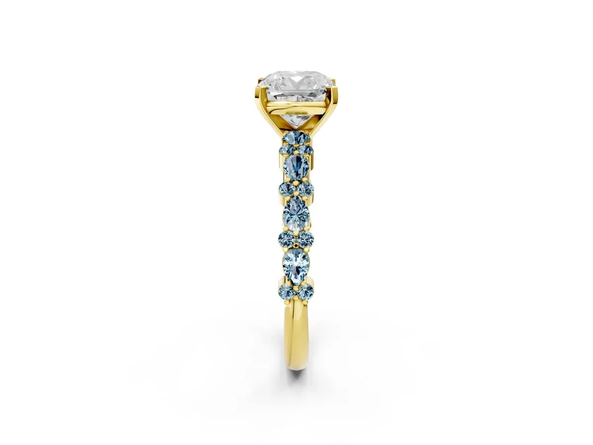 Cushion Cut Diamond Side Stone Solitaire Ring with Round Aquamarine and Four-Prong Setting Yellow gold