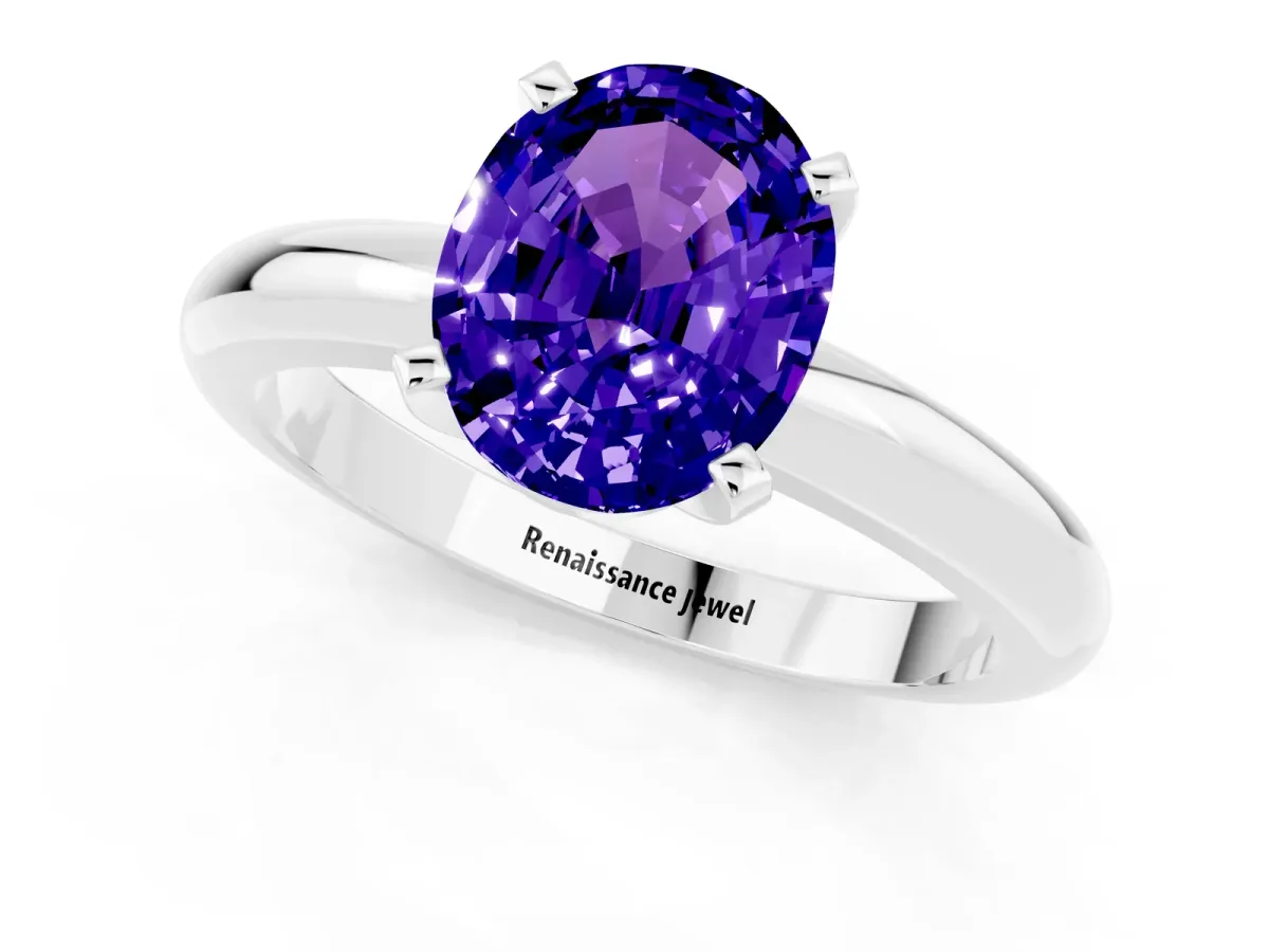 Oval Cut Tanzanite Solitaire Engagement Ring with Round Band and Four-Prong Setting Platinum