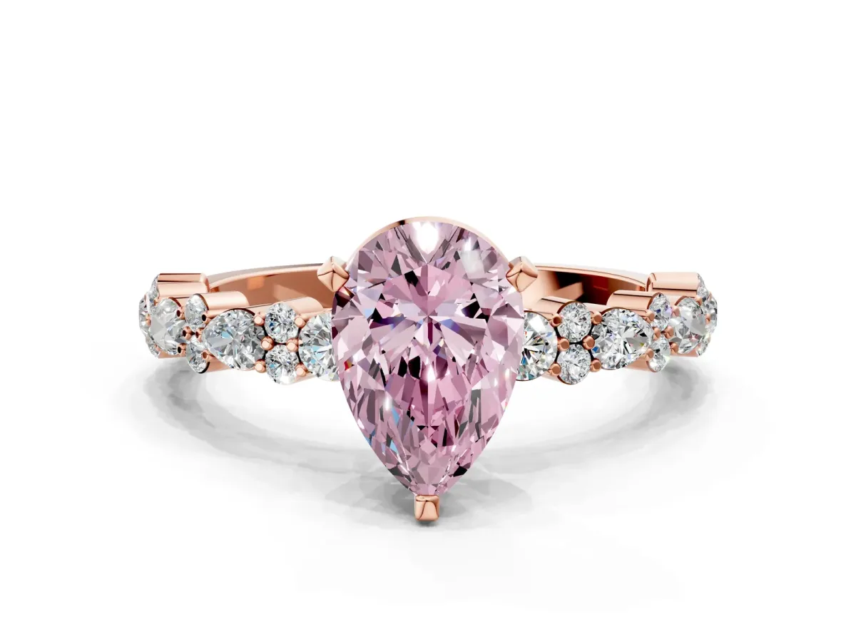 Fancy Pink Pear Cut Diamond Side Stone Solitaire Ring with Round and Four-Prong Setting Rose gold