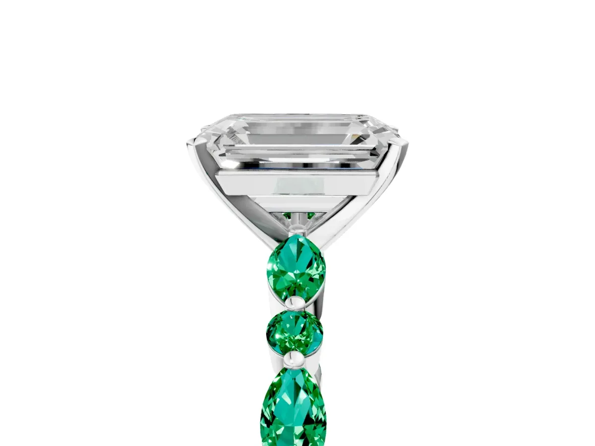 Emerald Cut Diamond Ring with Marquise and Round Emerald Side Stones and Four-Prong Setting Silver