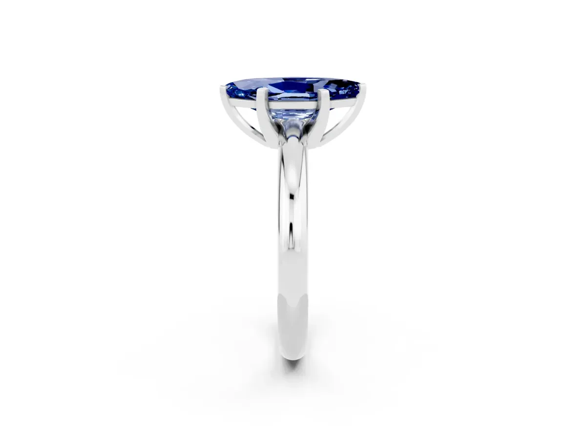 Marquise Cut Blue Sapphire Solitaire Engagement Ring with Round Band and Four-Prong Setting Silver