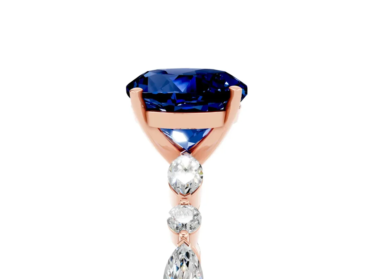 Round Cut Blue Sapphire Ring with Marquise and Round Side Stones and Four-Prong Setting Rose gold