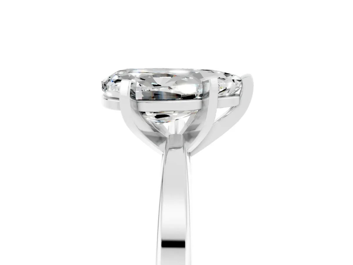 Pear Cut Moissanite Solitaire Engagement Ring with Classic Band and Four-Prong Setting Silver