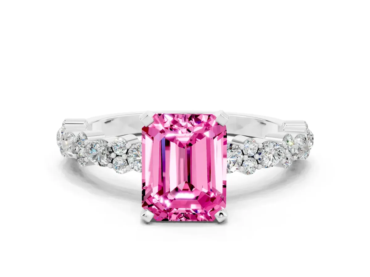 Emerald Cut Pink Sapphire Side Stone Solitaire Ring with Round and Four-Prong Setting White gold