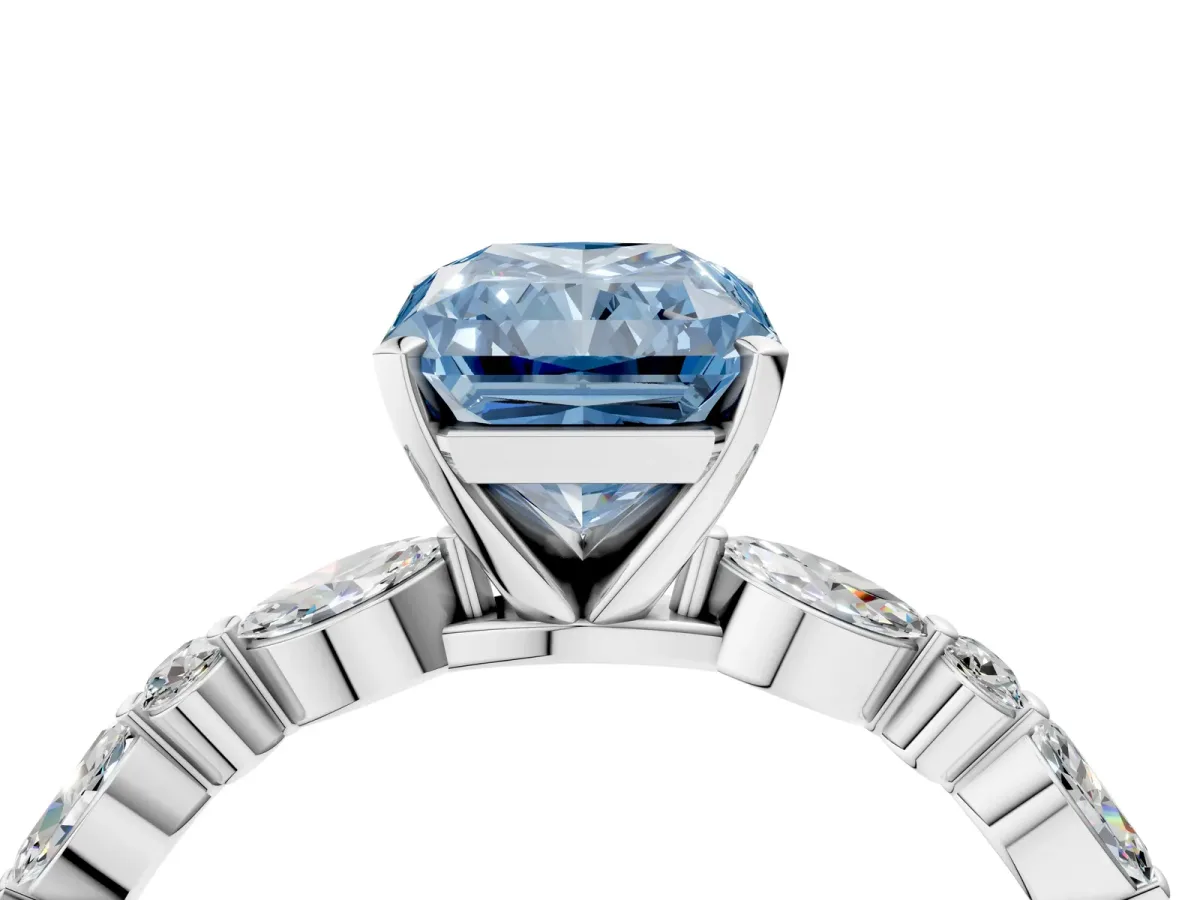 Fancy Blue Radiant Cut Diamond Ring with Marquise and Round Side Stones and Four-Prong Setting Silver