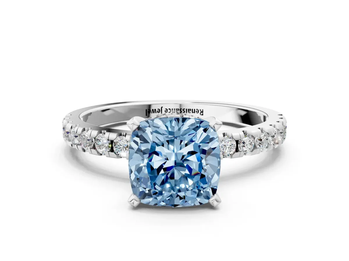 Fancy Blue Cushion Cut Diamond Solitaire Ring with Round Pavé Band and Four-Prong Setting Silver