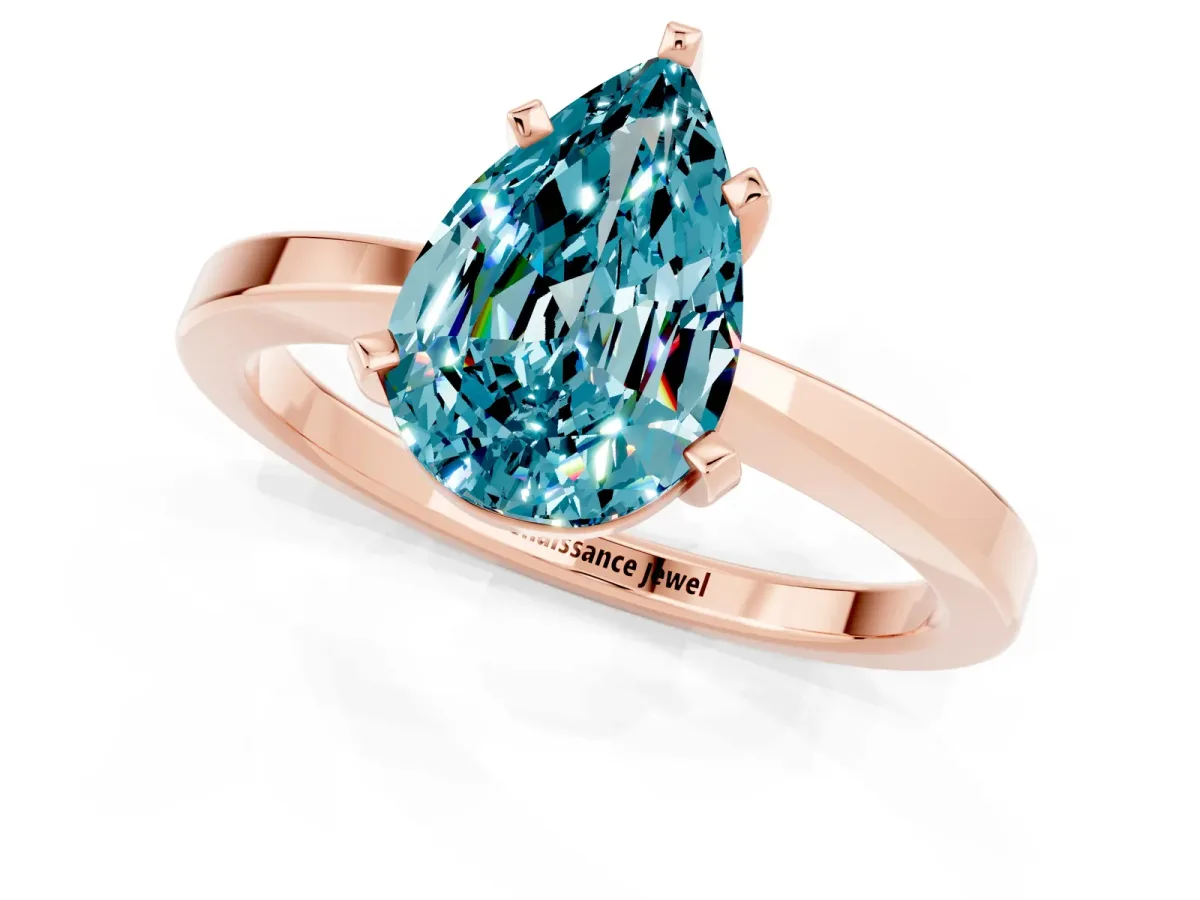 Pear Cut Blue Topaz Solitaire Engagement Ring with Classic Band and Four-Prong Setting Rose gold
