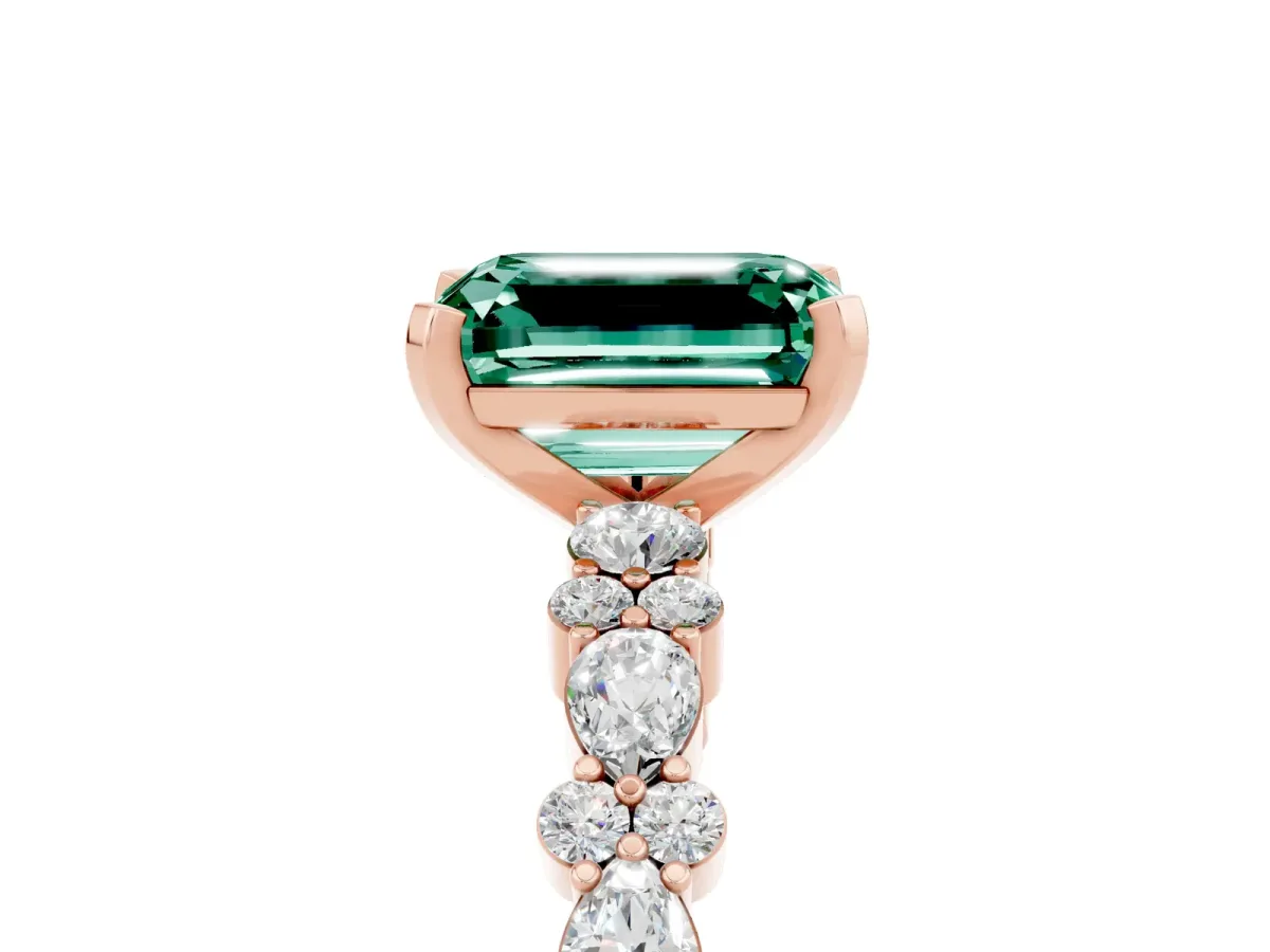 Emerald Cut Green Sapphire Side Stone Solitaire Ring with Round and Four-Prong Setting Rose gold