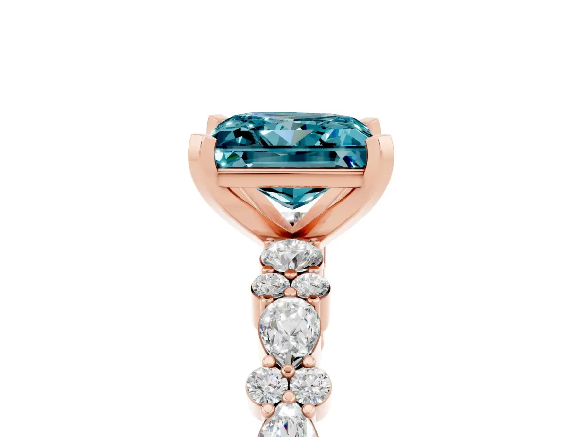 Princess Cut Blue Topaz Side Stone Solitaire Ring with Round and Four-Prong Setting Rose gold