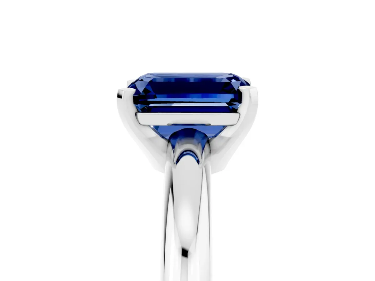 Emerald Cut Blue Sapphire Solitaire Engagement Ring with Round Band and Four-Prong Setting Platinum