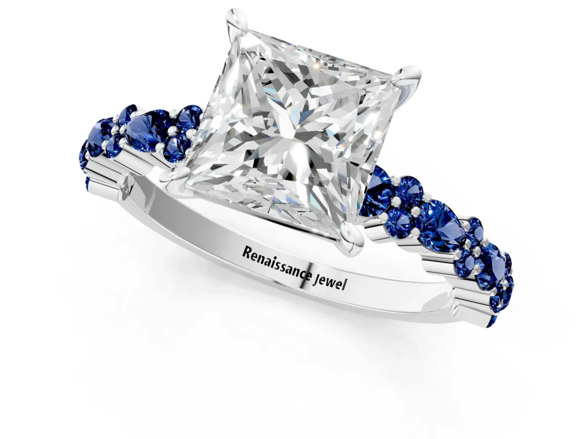 Princess Cut Diamond Side Stone Solitaire Ring with Round Blue Sapphire and Four-Prong Setting Platinum