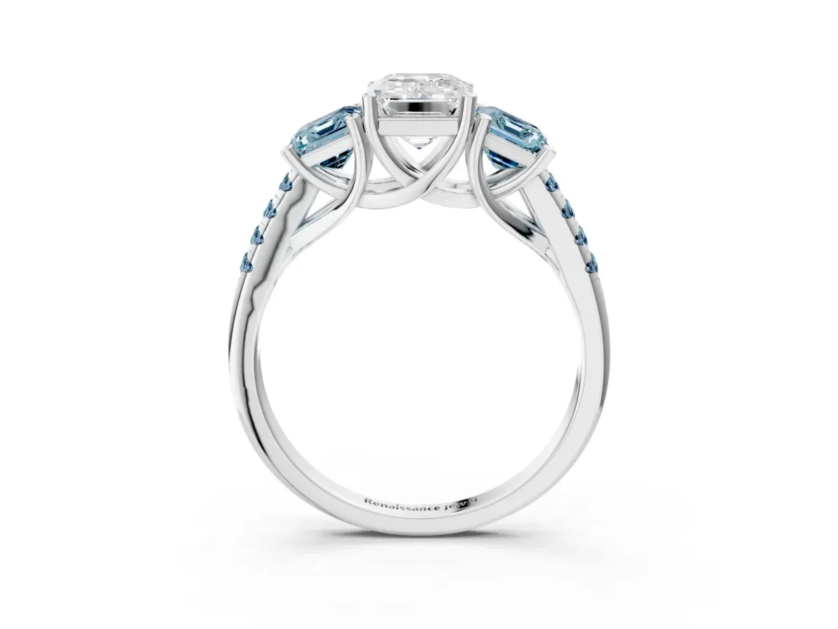 Three-Stone Emerald Cut Diamond Ring with Round Aquamarine Pavé Band and Prong Setting Platinum