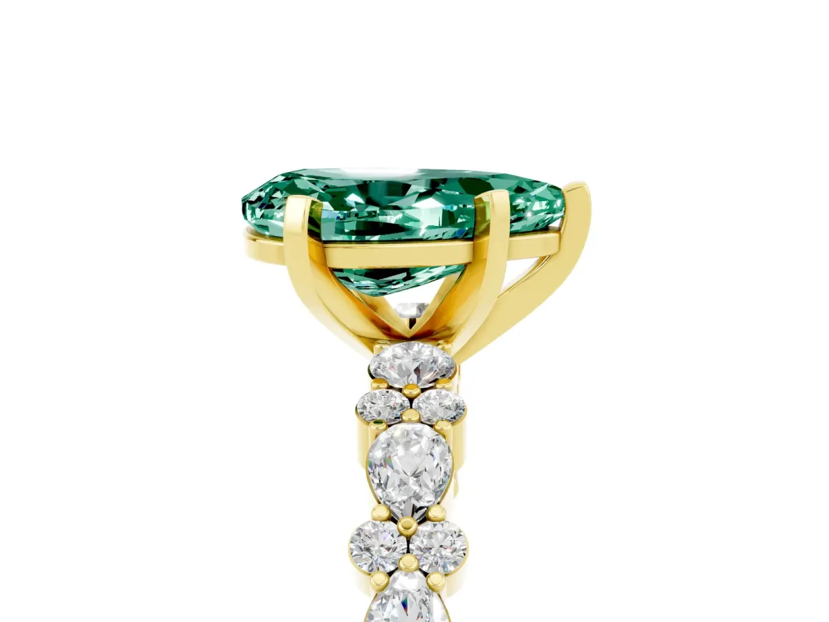 Pear Cut Green Sapphire Side Stone Solitaire Ring with Round and Four-Prong Setting Yellow gold