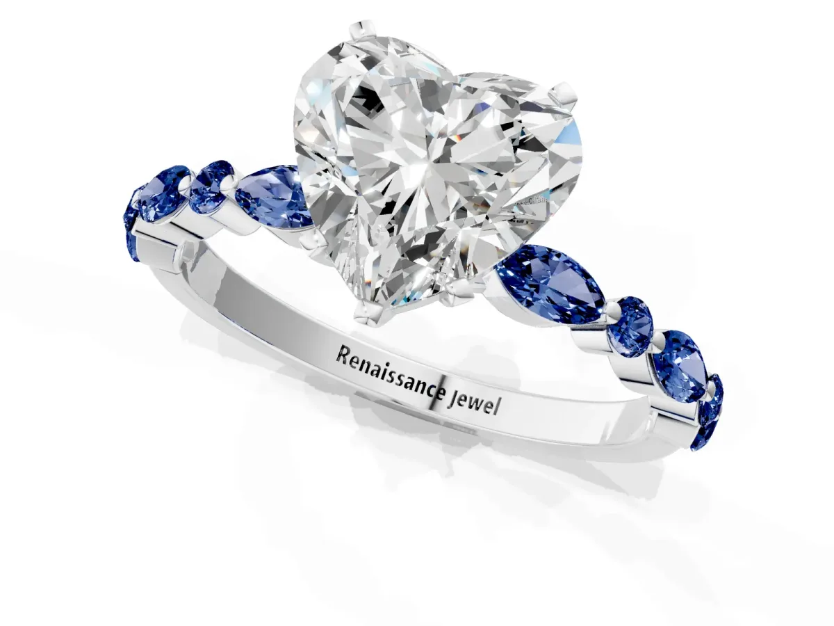 Heart Cut Diamond Ring with Marquise and Round Blue Sapphire Side Stones and Four-Prong Setting Silver