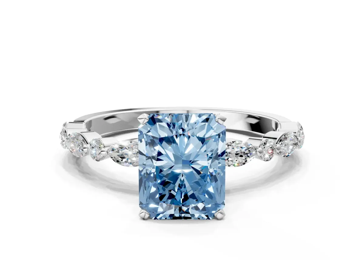 Fancy Blue Radiant Cut Diamond Ring with Marquise and Round Side Stones and Four-Prong Setting Silver