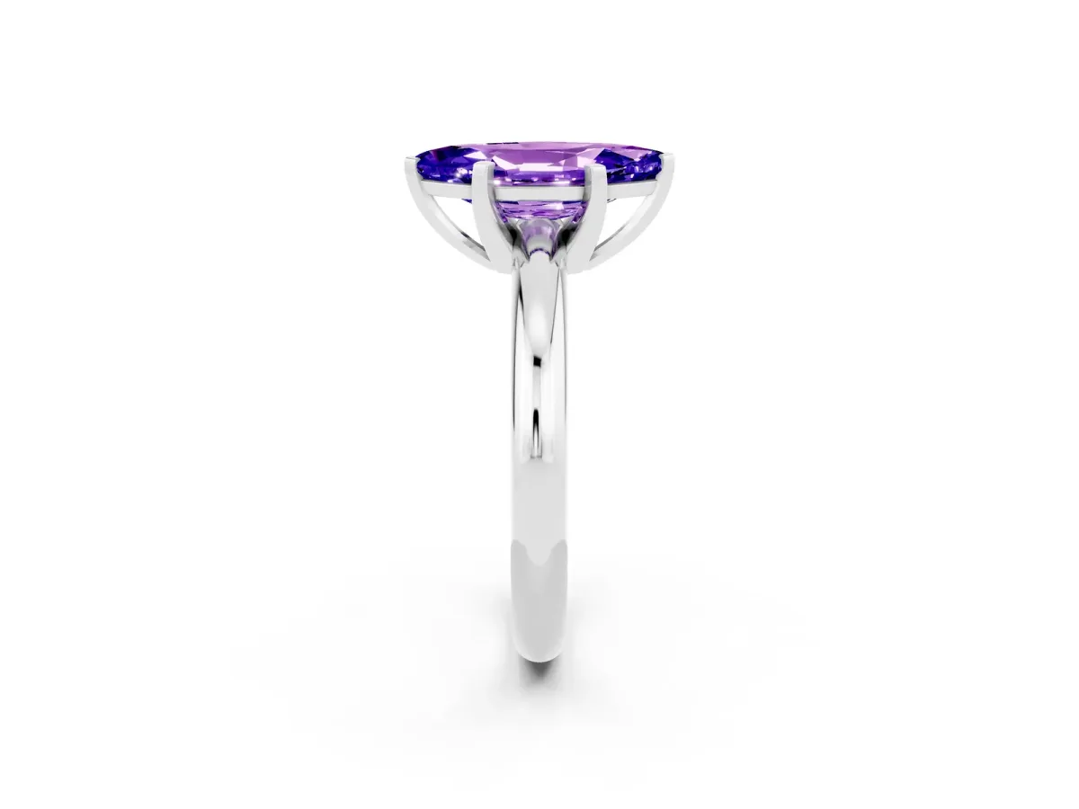 Marquise Cut Tanzanite Solitaire Engagement Ring with Round Band and Four-Prong Setting Silver