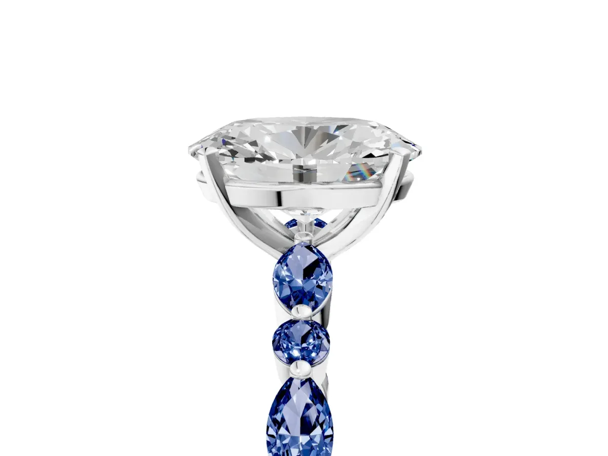 Oval Cut Diamond Ring with Marquise and Round Blue Sapphire Side Stones and Four-Prong Setting Silver
