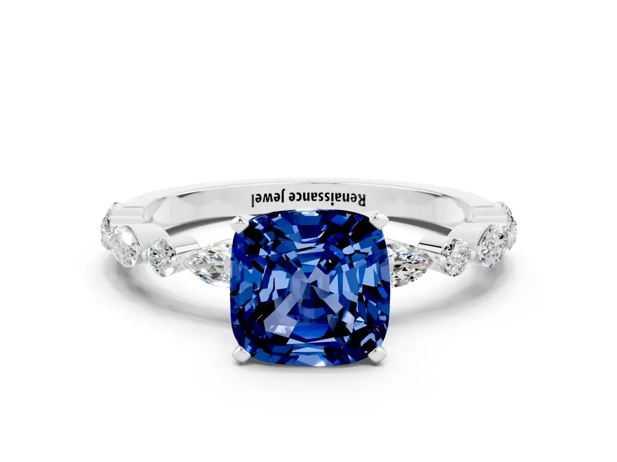 Cushion Cut Blue Sapphire Ring with Marquise and Round Side Stones and Four-Prong Setting Silver