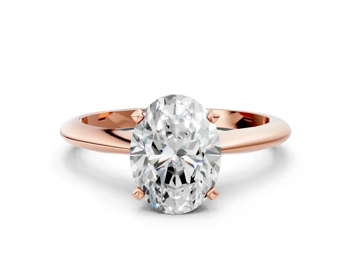 Oval Cut Diamond Solitaire Engagement Ring with Classic Band and Four-Prong Setting Rose gold