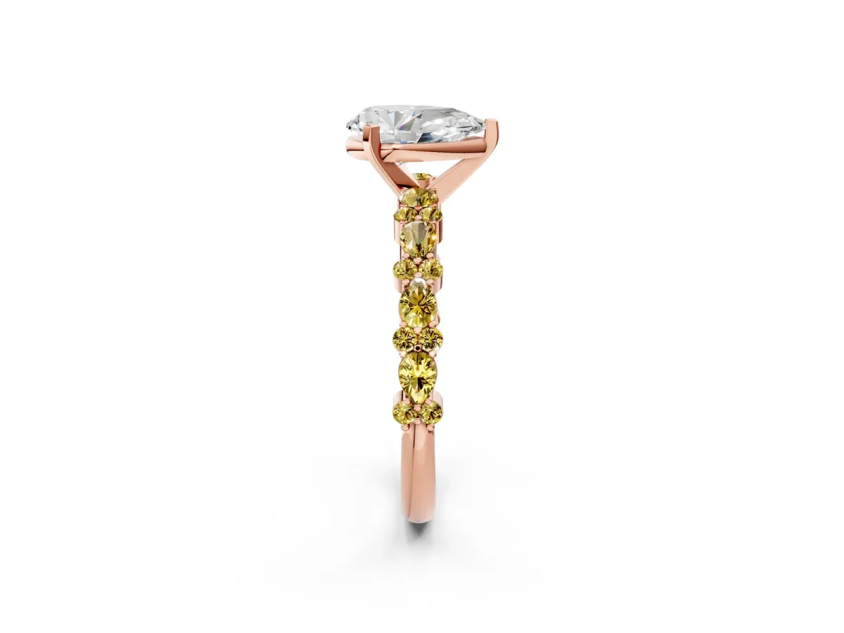 Pear Cut Diamond Side Stone Solitaire Ring with Round Yellow Sapphire and Four-Prong Setting Rose gold