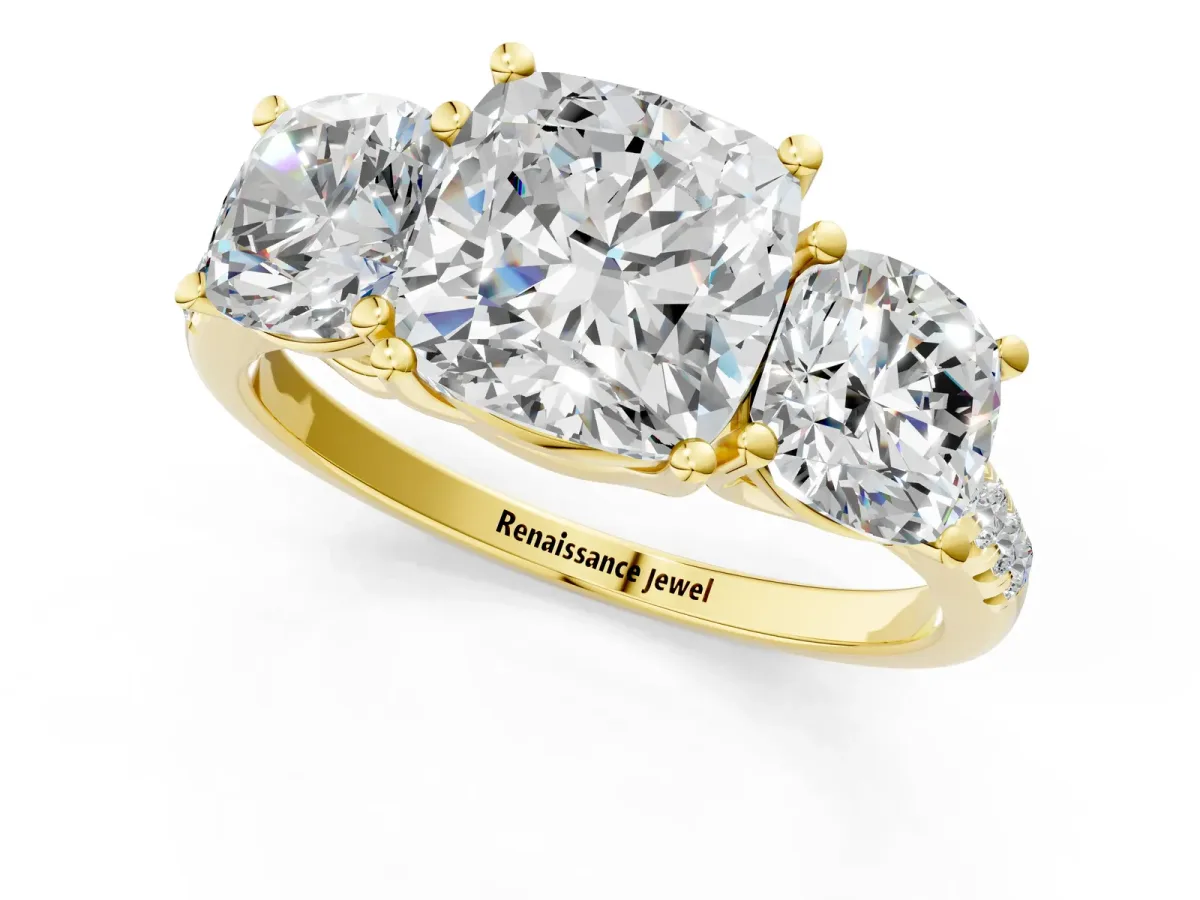 Fancy Black Three-Stone Cushion Cut Diamond Ring with Round Pavé Band and Prong Setting Yellow gold