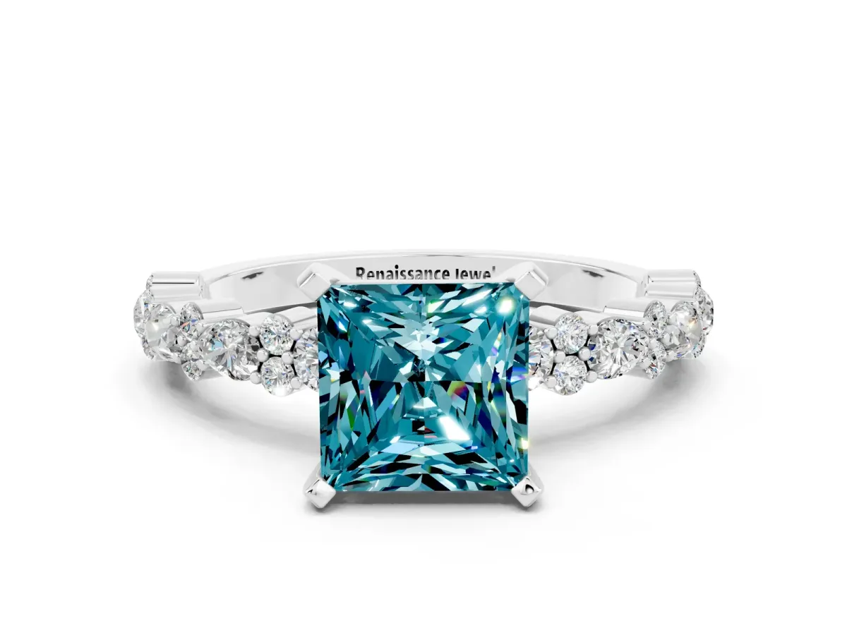 Princess Cut Blue Topaz Side Stone Solitaire Ring with Round and Four-Prong Setting Silver