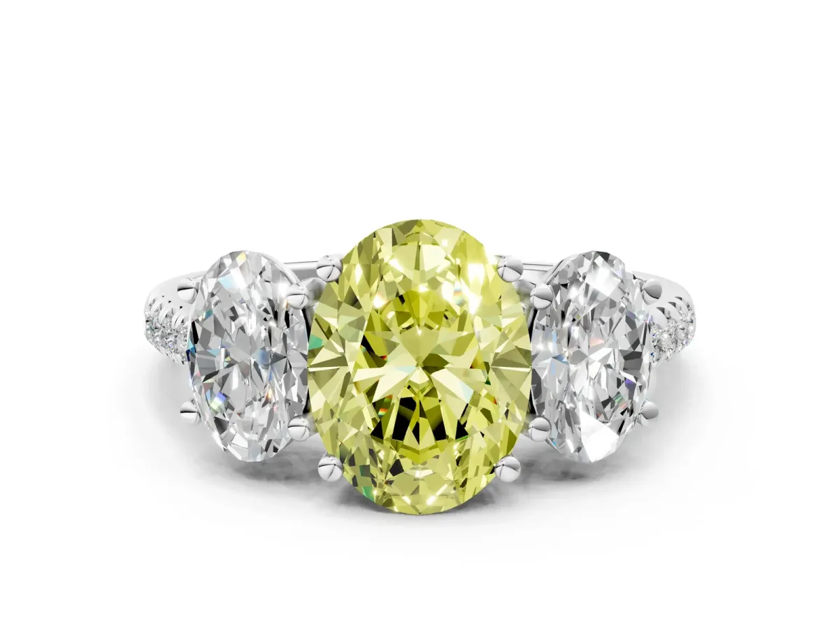 Fancy Yellow Three-Stone Oval Cut Diamond Ring with Round Pavé Band and Prong Setting White gold