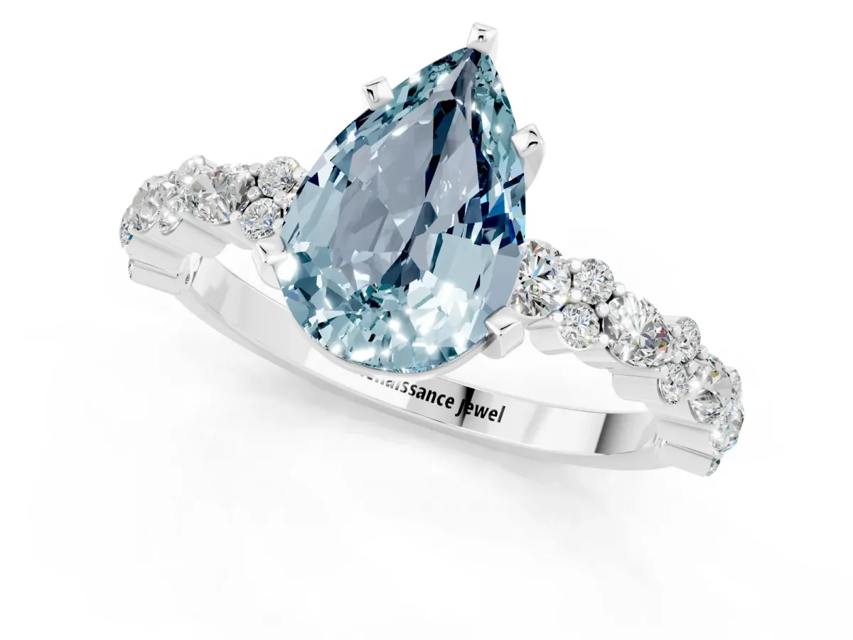 Pear Cut Aquamarine Side Stone Solitaire Ring with Round and Four-Prong Setting White gold