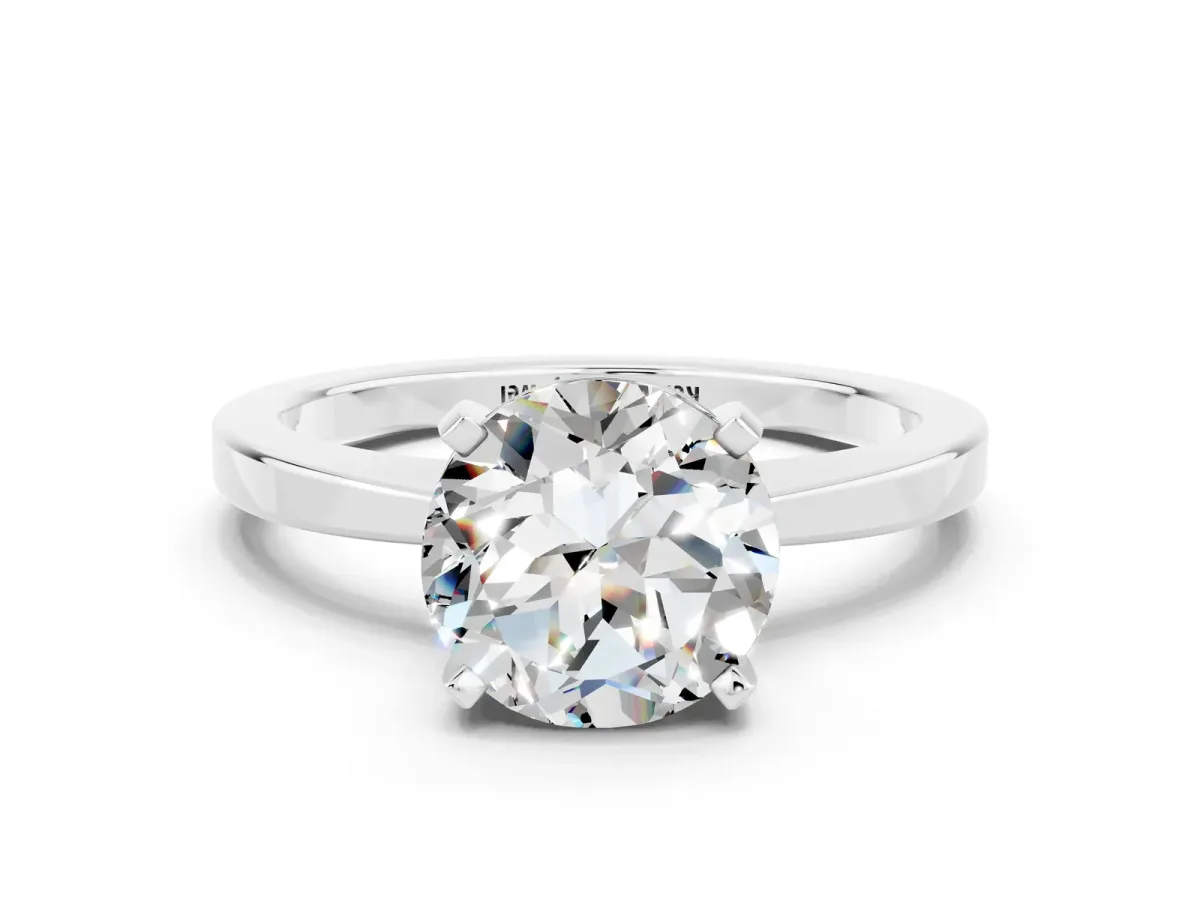 Round Cut Moissanite Solitaire Engagement Ring with Classic Band and Four-Prong Setting Silver