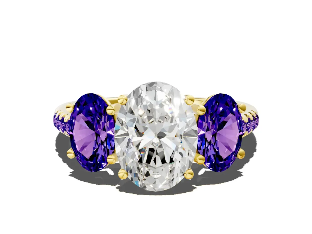 Three-Stone Oval Cut Diamond Ring with Round Tanzanite Pavé Band and Prong Setting Yellow gold