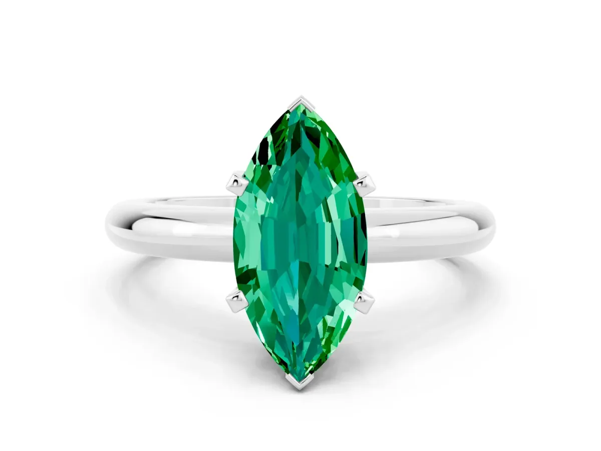 Marquise Cut Emerald Solitaire Engagement Ring with Round Band and Four-Prong Setting Silver
