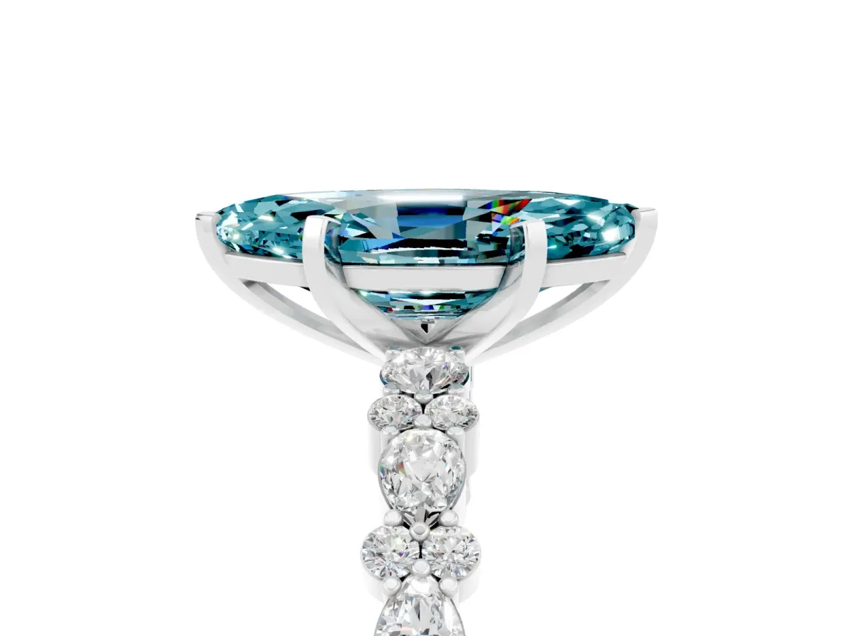 Marquise Cut Blue Topaz Side Stone Solitaire Ring with Round and Four-Prong Setting White gold